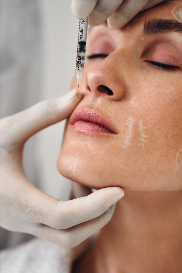 Woman getting lip filler