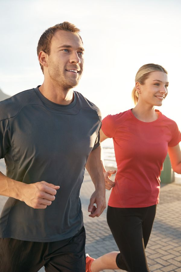 image of a fit couple going for a run together